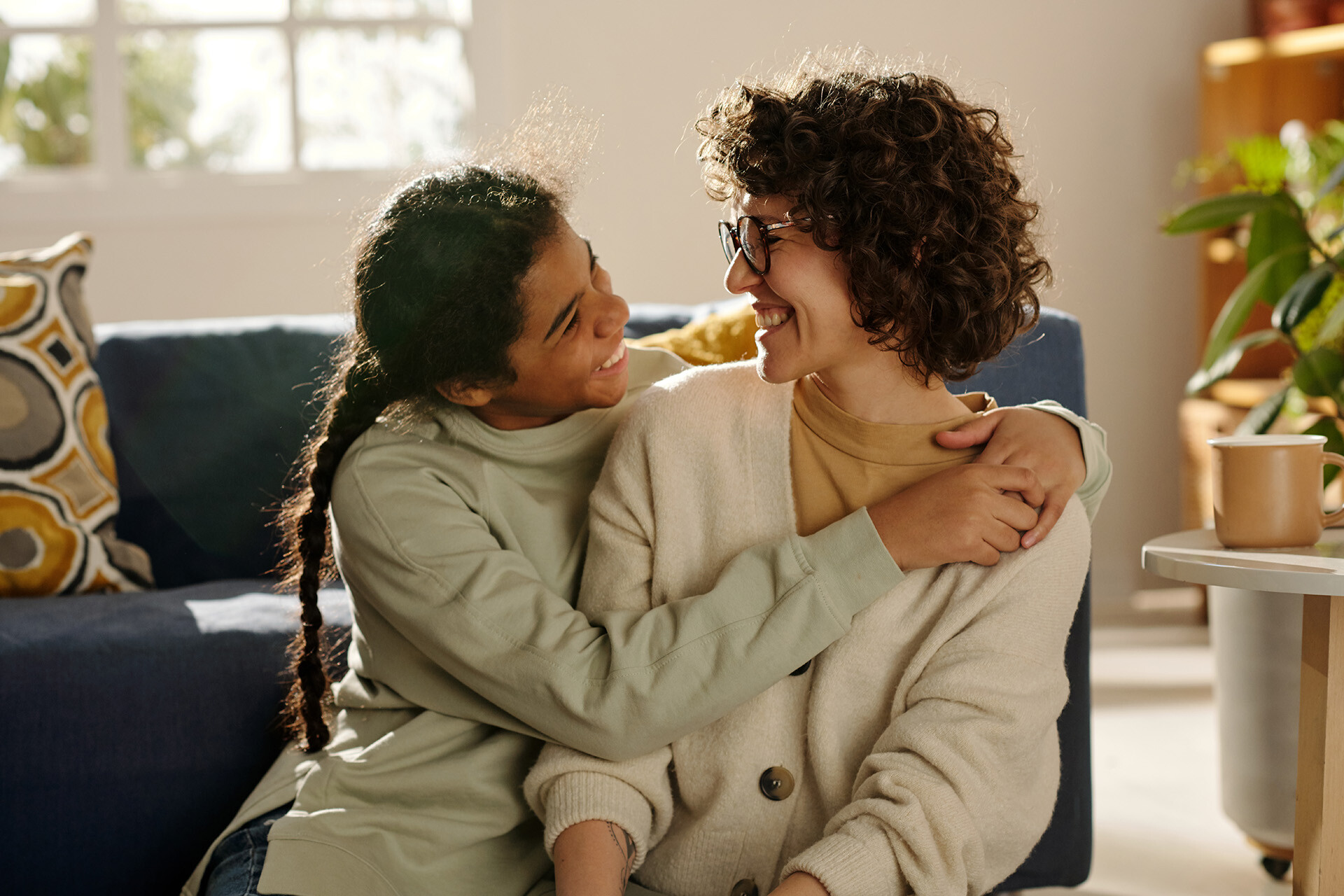 happy-teenage-girl-embracing-her-foster-mom-2023-11-27-05-07-56-utc-1